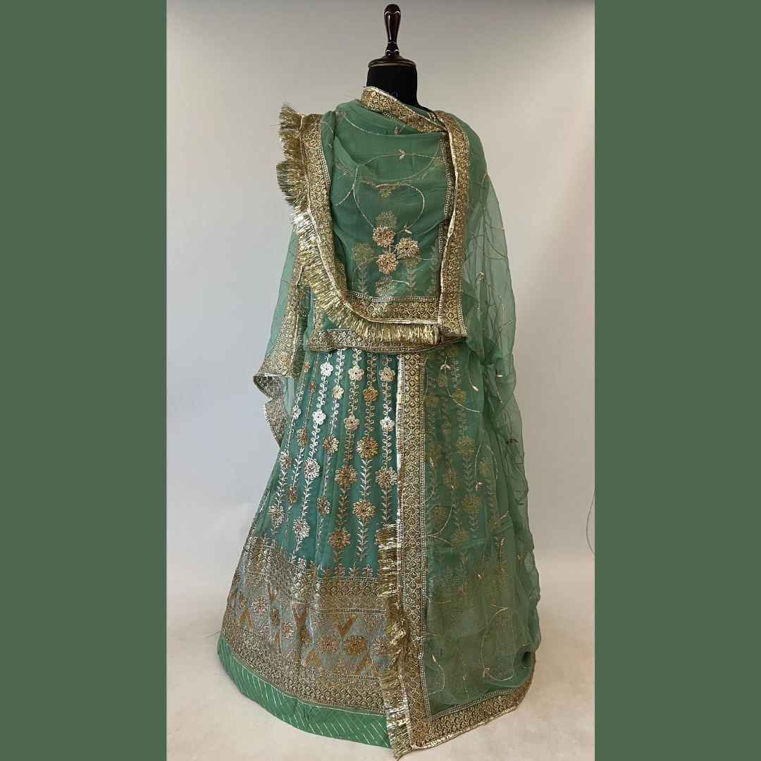 green rajputi dress